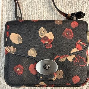 Coach black purse with painted flowers, new with tags